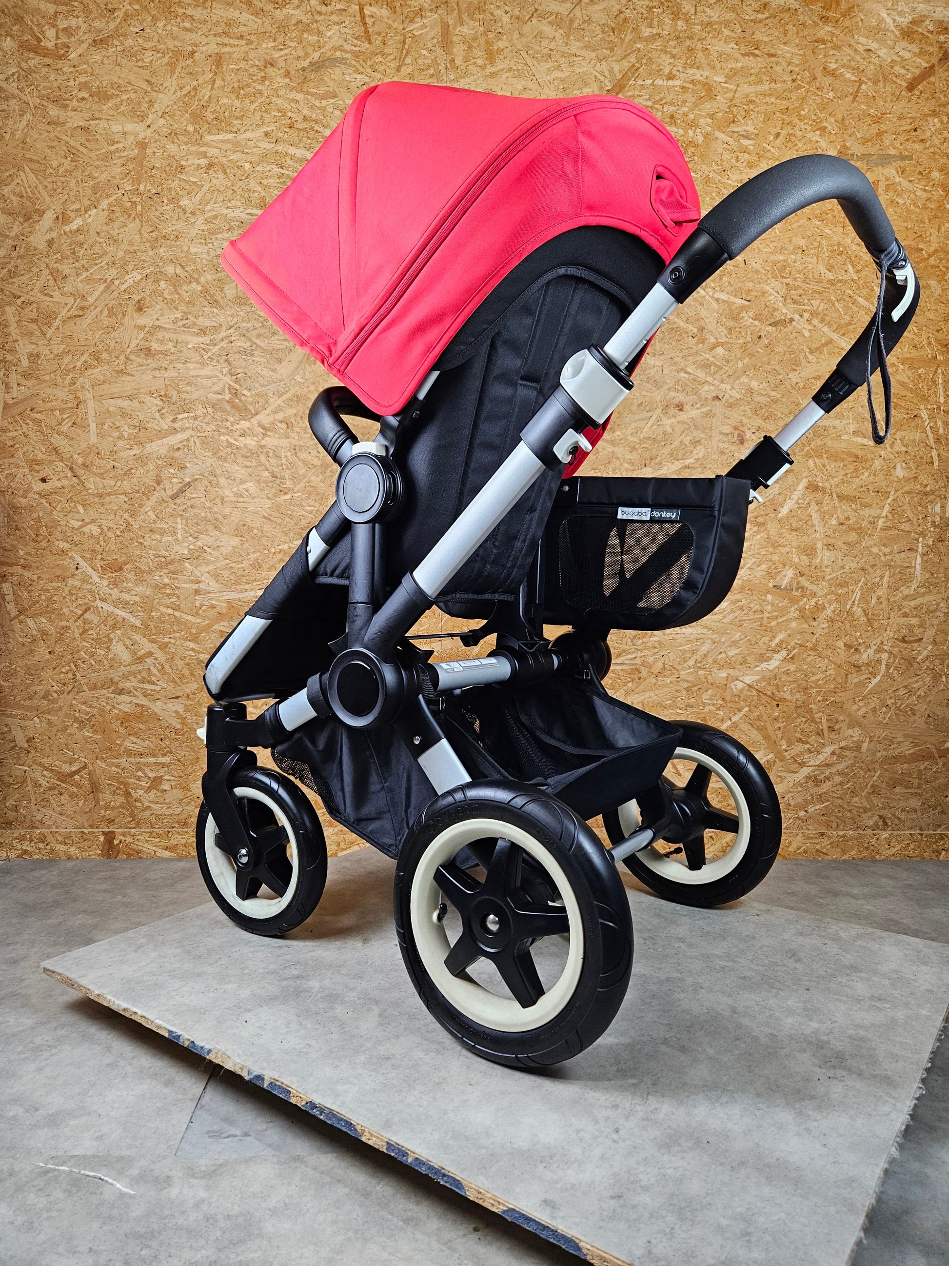 Bugaboo - Donkey Mono Kinderwagen (1 Liegewanne / 1 Sportsitz) Inkl. Seitliche GepƤcktasche - Schwarz Rot in Gutem